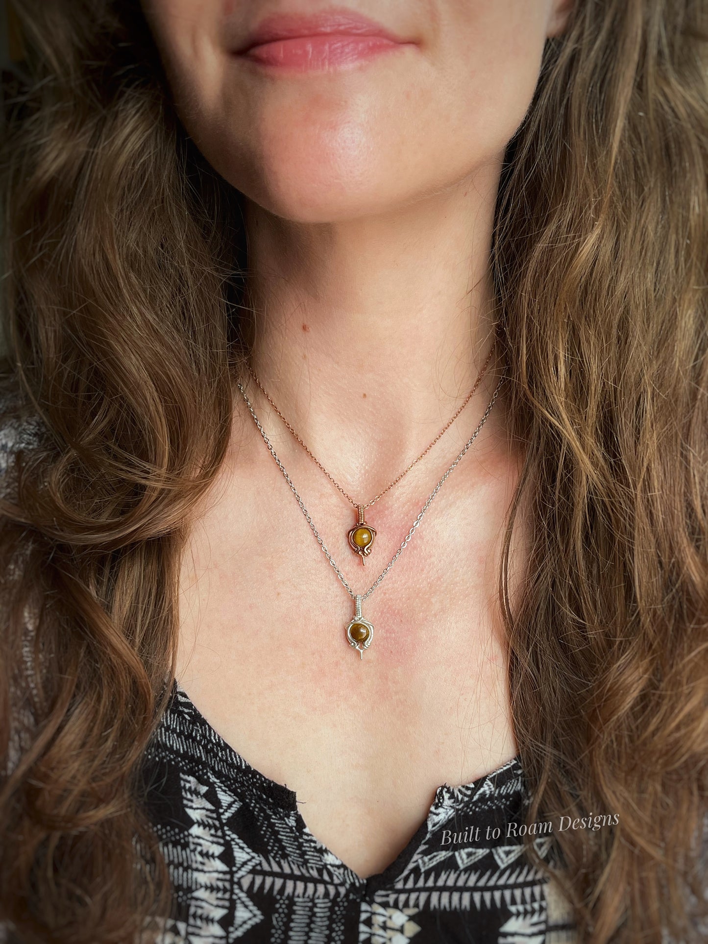 Tiger’s Eye pendant necklace from Tiny But Mighty collection, silver and copper, front view on body