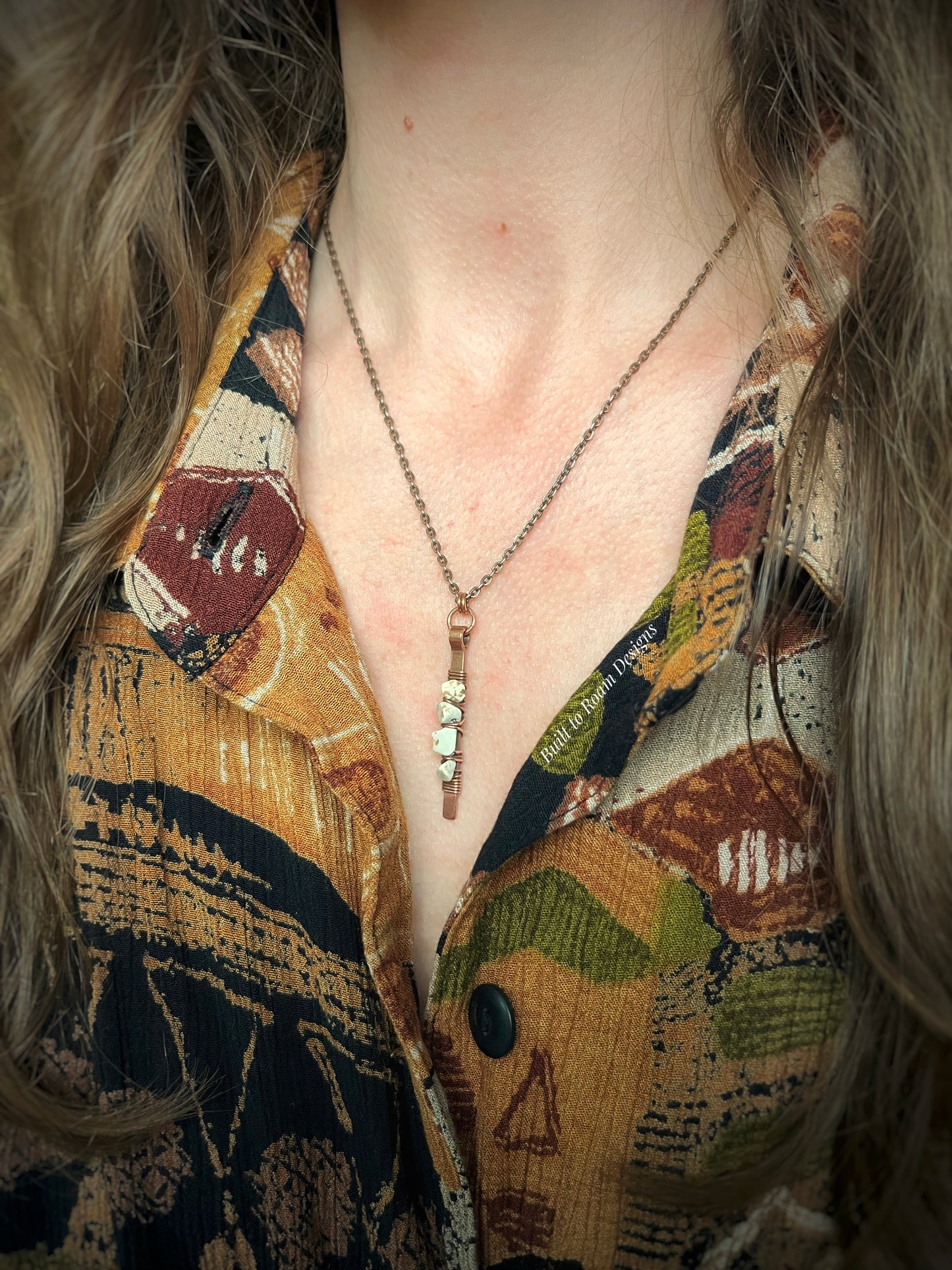 Copper bar necklace with white turquoise chip beads on a person - side view - Horizon 